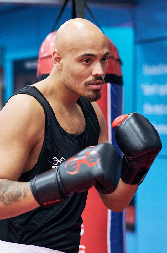 STING Evolution Boxing Glove — Black/Red