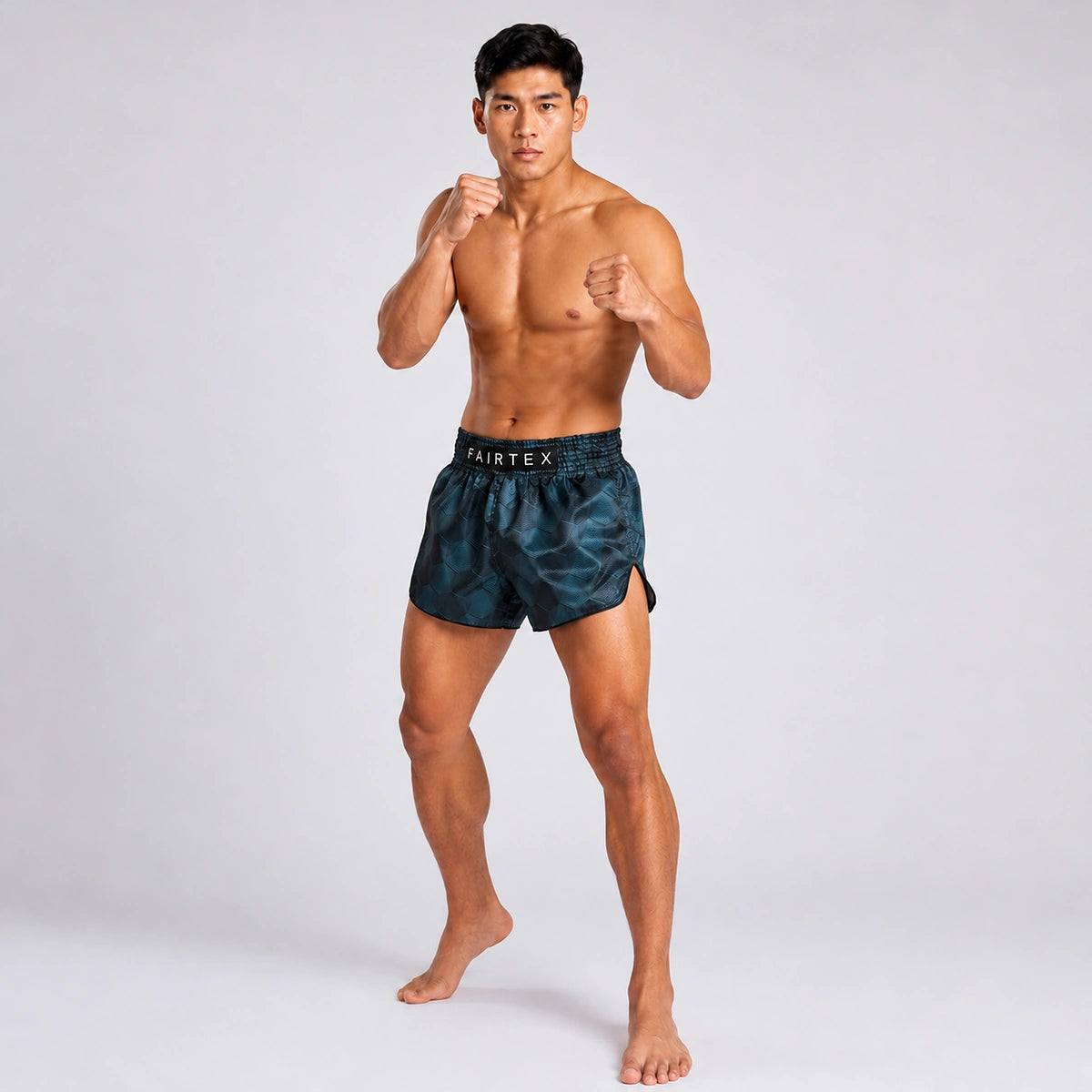 Fairtex BS1902 Stealth Grey Muay Thai Shorts - model in fighting stance
